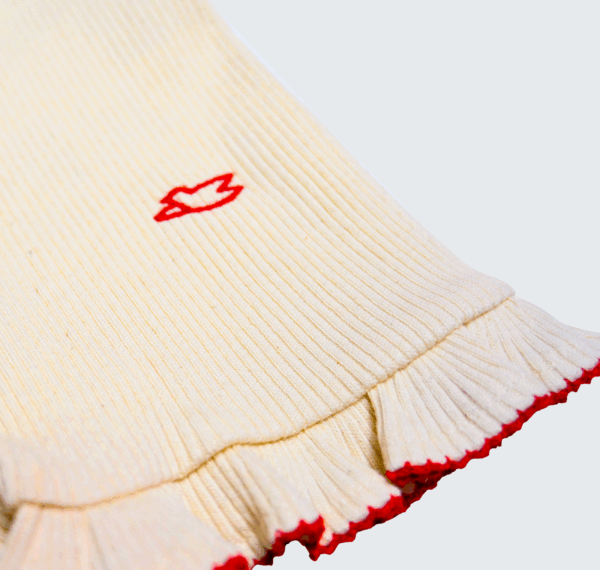 Barboteuse à bretelles avec col rond