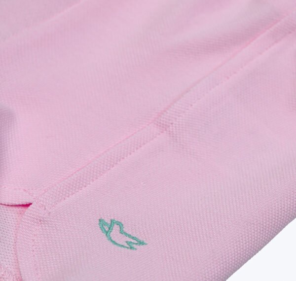 Short en piqué rose à découpe et broderie colombe